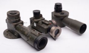 Three various gun sights comprising an M17 Elbow telescope,