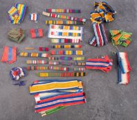 A collection of various medal ribbons and ribbon bars.