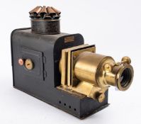 A late 19th/early 20th century brass and tinplate Magic Lantern, maker W.C Hughes, London .