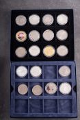 A collection of ERII crown sized coins including Guernsey, Falkland, Zambia,