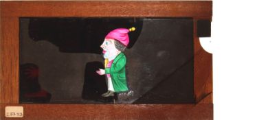 A hand painted single slip Magic Lantern slide 'Man with extending nose',