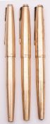 Three Parker 61 gold plated fountain pens.