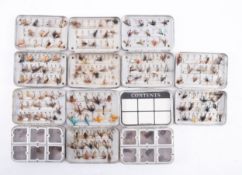 Seven Wheatley alloy Fly Fishing boxes containing mostly dry flies some wet,