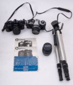 An Olympus OM10 35mm SLR camera, '2138592', fitted 50mm lens,