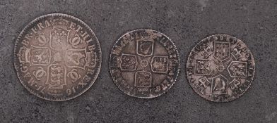 A 1671 Charles II 1/2 Crown, 1758 Shilling, 1787 Shilling.