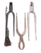 An unusual bottle opener, probably by Rodgers & Son, with wire cutter,