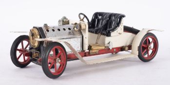 An unboxed Mamod Steam Roadster, white with black seats, plated bonnet,