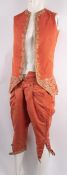An 18th-century gentleman's copper corded silk two-piece suit comprising a waistcoat and breeches,