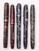 A group of five Conway Stewart fountain pens, comprising of a red and blue marbled no.15, no.