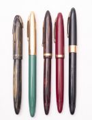A group of five various Sheaffer fountain pens, including a red stripped no.