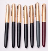 A group of seven Parker 51 fountain pens, comprising of five black bodied gilt caped examples,