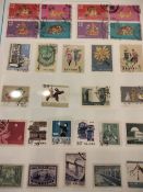 A Collection of stamps in 11 ring binders including China, Singapore,