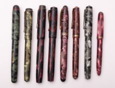 An Eversharp red marbled leaver fountain pen with gilt clip and fittings,