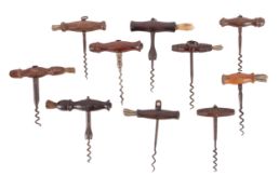 Ten wood T-handle corkscrews, some with brushes, including one marked 'H.A. KNOX & CO.