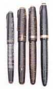 A group of four Parker 'Vacumatic' fountain pens, in laminated green pearl, grey pearl,