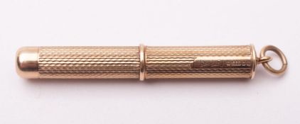 An Elizabeth II 9 carat gold cigar piecer, maker S J Rose and Son, Birmingham 1987,