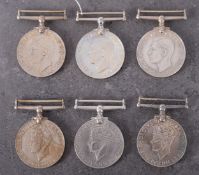 Three WWII War medals and three WWII Defence Medals.