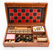 WITHDRAWN LOT A mahogany cased game compendium, comprising boxwood Staunton pattern