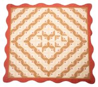 A late 20th century quilted bedspread and matching cushion covers,
