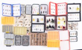 Four Wheatley fly boxes- together with three plastic boxes of flies and a quantity of empty plastic
