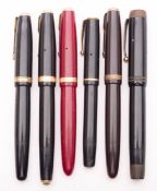 A collection of six various parker pens, comprising of two black and gilt 'Vacumatic' pens,