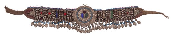 A Pakistani white metal and fabric necklace/choker hung with pendants and set with beads and