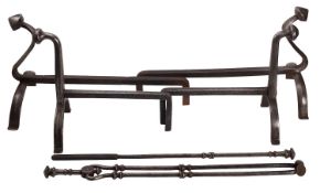 Two pairs of steel andirons, in 17th century style, early 20th century; the larger pair 34cm high,