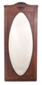 A French oak framed wall mirror,