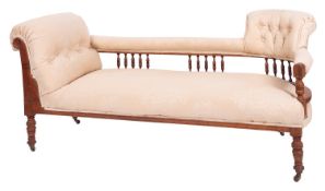 An Edwardian walnut and button upholstered chaise longue, early 20th century; with outscrolled end,