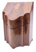 A George III mahogany and inlaid serpentine fronted knife box; bordered with boxwood lines,