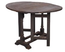 An oak gateleg table,