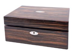 A Victorian coromandel sewing box the interior fitted with a lift-out tray and containing an