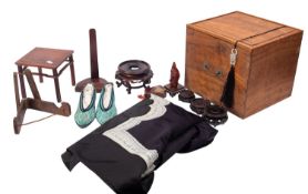 A Chinese silk jacket and a pair of turquoise embroidered silk slippers,