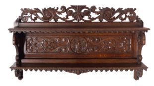 A set of Victorian oak wall shelves, probably Scottish,