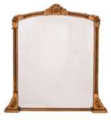 A Victorian carved and giltwood framed arched overmantel mirror,