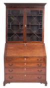 A George III mahogany bureau bookcase,