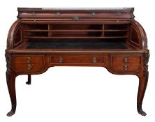 A mahogany and gilt metal mounted cylinder bureau with ormulu mounts in Louise XV Transitional