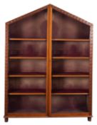 A Victorian oak and glazed bookcase in Gothic taste, late 19th century; of lancit form,