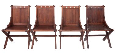 A set of four Victorian pitch pine Glastonbury chairs,