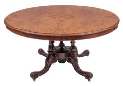 A Victorian walnut oval centre table,