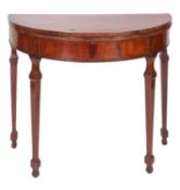 A late George III mahogany and crossbanded demi-lune card table,