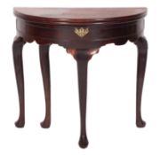 A George II mahogany and walnut demi-lune tea table,