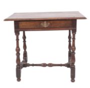 A William and Mary oak side table, late 17th century; the top with moulded edges,