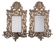 A pair of gilt metal three light girandoles in Louis XV style,