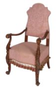 A mahogany and upholstered elbow chair in early 18th century Continental taste,