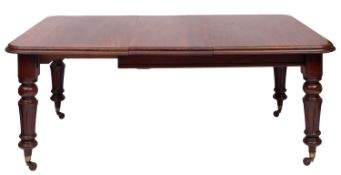A Victorian mahogany extending dining ta
