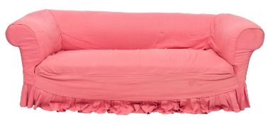 An upholstered sofa in Chesterfield styl