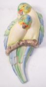 A Clarice Cliff wall pocket Budgerigars