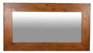 A large teak framed wall mirror, modern;
