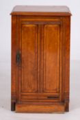 A Victorian satinwood veneered pot cupbo